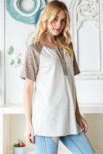 Load image into Gallery viewer, Heimish Full Size Animal Print Half Button Short Sleeve Top