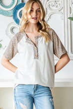 Load image into Gallery viewer, Heimish Full Size Animal Print Half Button Short Sleeve Top