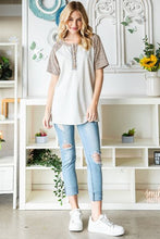 Load image into Gallery viewer, Heimish Full Size Animal Print Half Button Short Sleeve Top