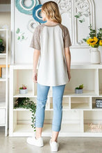 Load image into Gallery viewer, Heimish Full Size Animal Print Half Button Short Sleeve Top