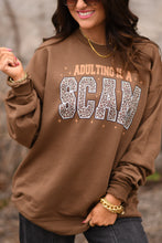 Load image into Gallery viewer, Adulting Is A Scam Sweatshirt
